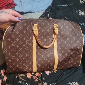 Vouis Vuitton travel bag